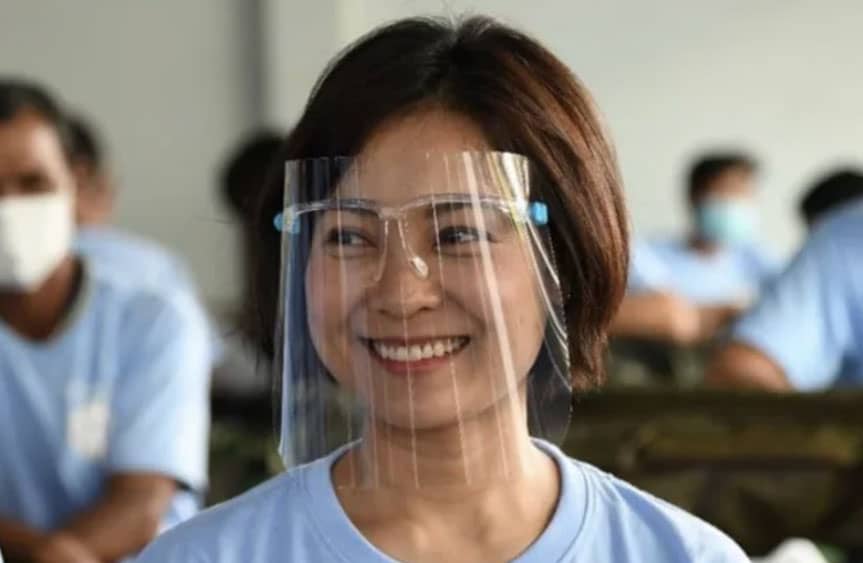 Cambodian economist and Director General of the National Bank of Cambodia, Serey Chea, wearing a face shield and smiling