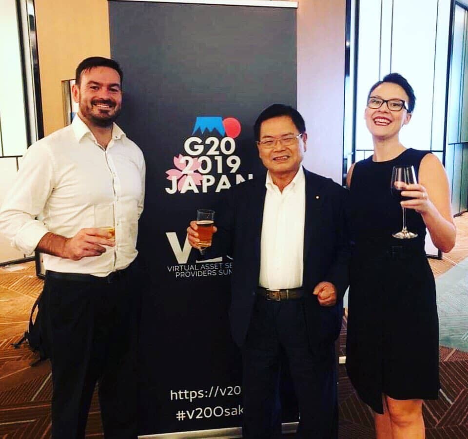 Emfarsis' Nathan Smale and Leah Callon-Butler with Japanese Congressman Naokazu Takemoto at the 2019 Osaka V20 Summit